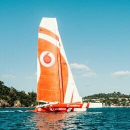 orange and white boat during daytime